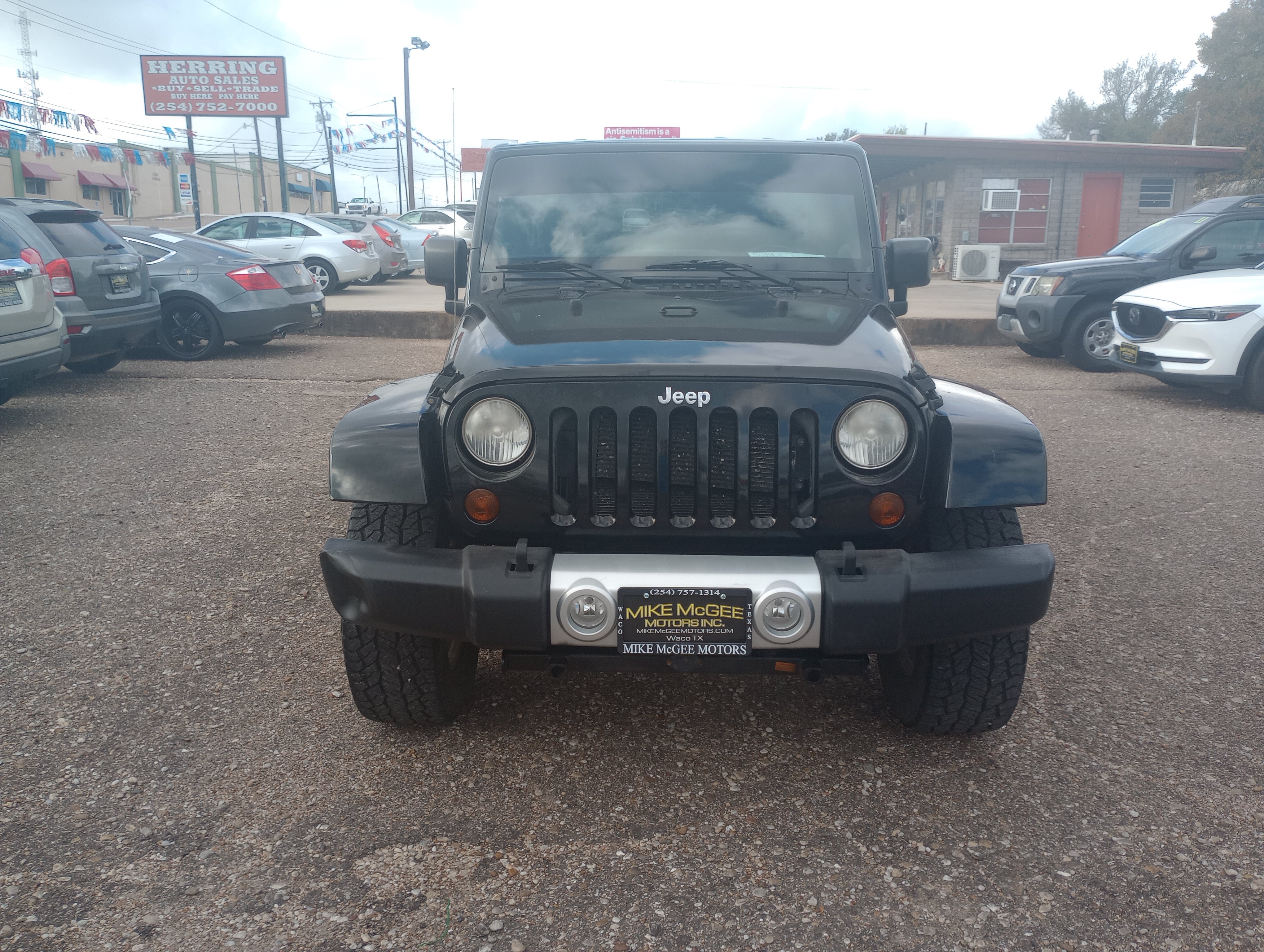 Used 2012 Jeep Wrangler Unlimited Sahara w/ Dual Top Group AWD/4WD image 2