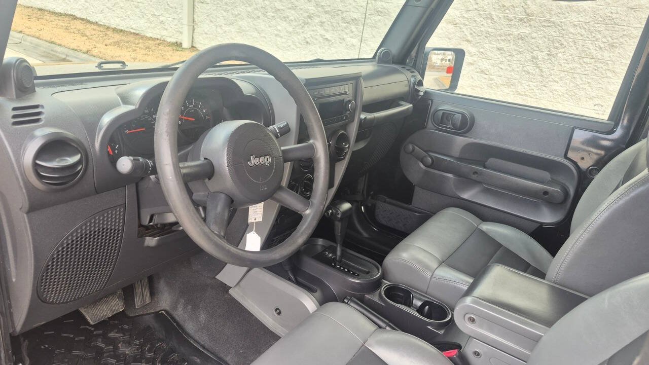Used 2009 Jeep Wrangler X w/ Black Appearance Group AWD/4WD image 32