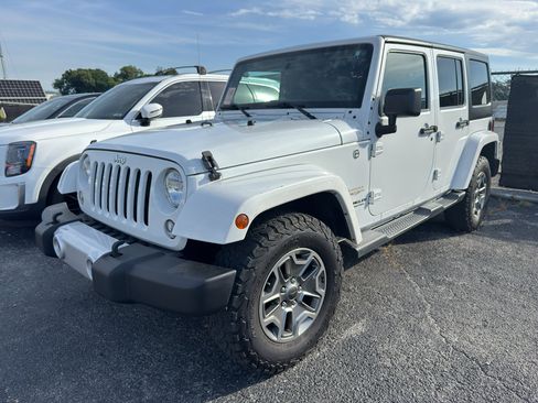 Used 2015 Jeep Wrangler Unlimited Sahara w/ Connectivity Group AWD/4WD image 1
