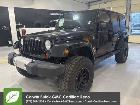 Used 2013 Jeep Wrangler Unlimited Sahara w/ Connectivity Group AWD/4WD image 1