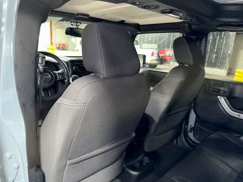 Used 2014 Jeep Wrangler Unlimited Sahara w/ Dual Top Group AWD/4WD image 25