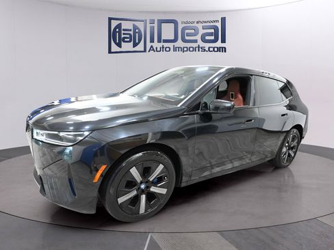 Used 2024 BMW iX xDrive50 w/ Premium Package AWD/4WD image 1