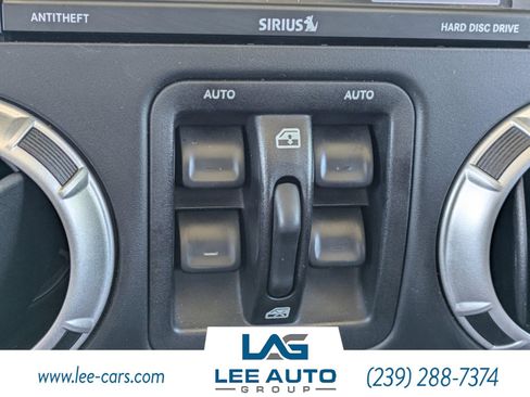 Used 2014 Jeep Wrangler Unlimited Sahara w/ Dual Top Group AWD/4WD image 22