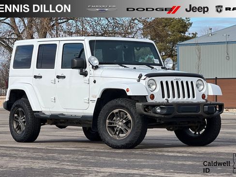Used 2013 Jeep Wrangler Unlimited Sahara w/ Connectivity Group AWD/4WD image 1