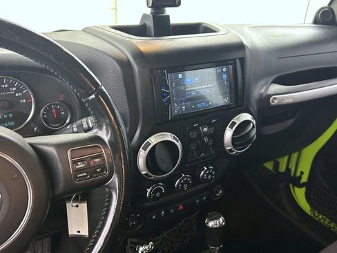 Used 2013 Jeep Wrangler Unlimited Sahara w/ Dual Top Group image 12
