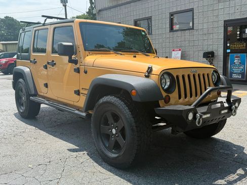 Used 2013 Jeep Wrangler Unlimited Sport AWD/4WD image 1