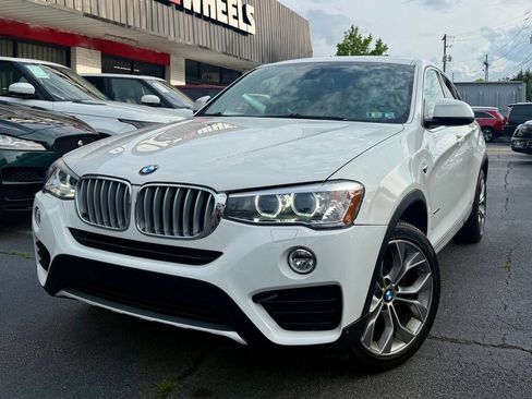 Used 2018 BMW X4 xDrive28i AWD/4WD image 1