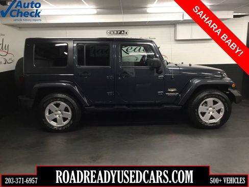 Used 2007 Jeep Wrangler Unlimited Sahara w/ Dual Top Group AWD/4WD image 1