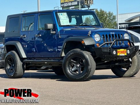Used 2010 Jeep Wrangler Unlimited Sport w/ Trailer Tow Group AWD/4WD image 1