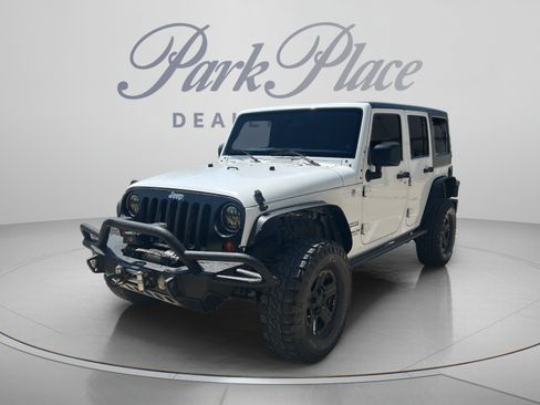 Used 2011 Jeep Wrangler Unlimited Sport w/ Connectivity Group AWD/4WD image 1
