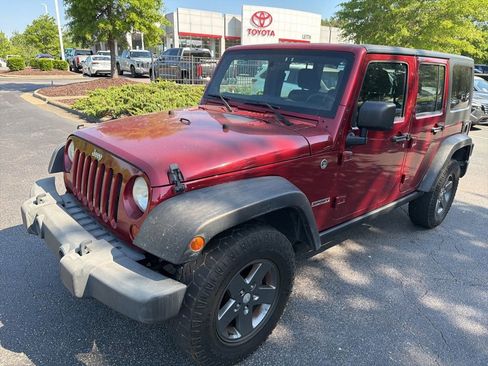 Used 2012 Jeep Wrangler Unlimited Sport AWD/4WD image 2
