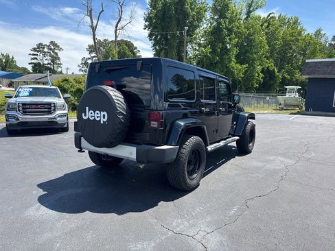 Used 2013 Jeep Wrangler Unlimited Sahara w/ Mopar Chrome Edition Group AWD/4WD image 5