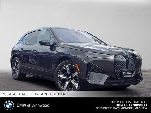 Used 2024 BMW iX xDrive50 w/ Premium Package AWD/4WD image 1