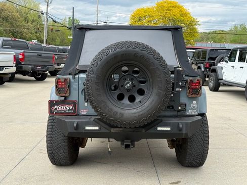 Used 2014 Jeep Wrangler Unlimited Sahara w/ Max Tow Package AWD/4WD image 13