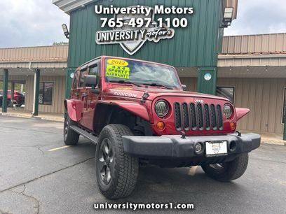 Used 2012 Jeep Wrangler Unlimited Rubicon w/ Dual Top Group