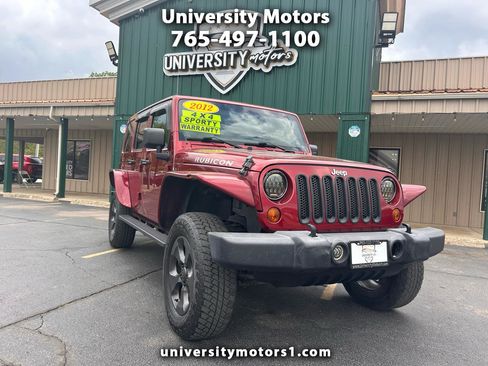 Used 2012 Jeep Wrangler Unlimited Rubicon w/ Dual Top Group image 1