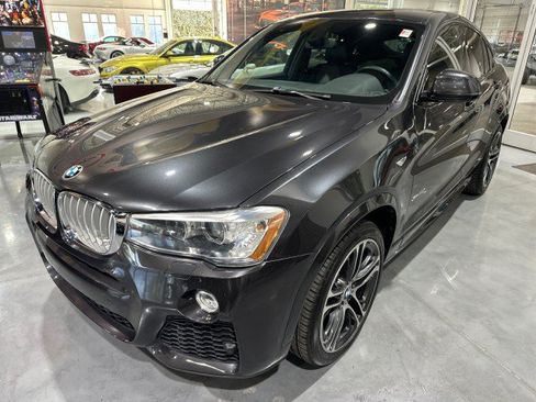 Used 2016 BMW X4 xDrive28i AWD/4WD image 1