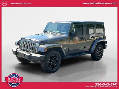 Used 2018 Jeep Wrangler Unlimited Sahara w/ Connectivity Group AWD/4WD image 1