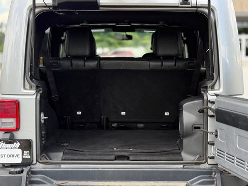 Used 2014 Jeep Wrangler Unlimited Rubicon w/ Dual Top Group AWD/4WD image 46