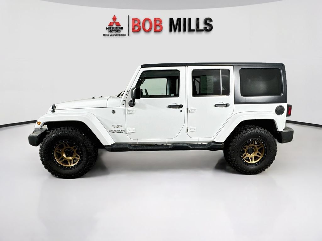 Used 2016 Jeep Wrangler Unlimited Sahara AWD/4WD image 4