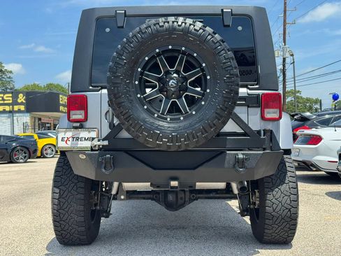 Used 2014 Jeep Wrangler Unlimited Sahara w/ Max Tow Package AWD/4WD image 5