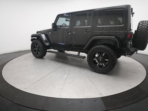 Used 2014 Jeep Wrangler Unlimited Rubicon w/ Dual Top Group AWD/4WD image 28