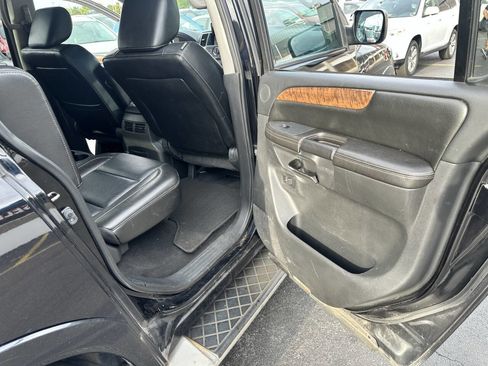 Used 2011 Nissan Armada Platinum w/ 2nd Row Captain Seat Pkg image 28