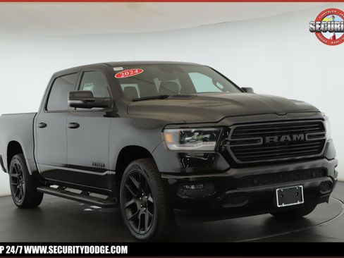 Used 2024 RAM 1500 Laramie AWD/4WD image 1