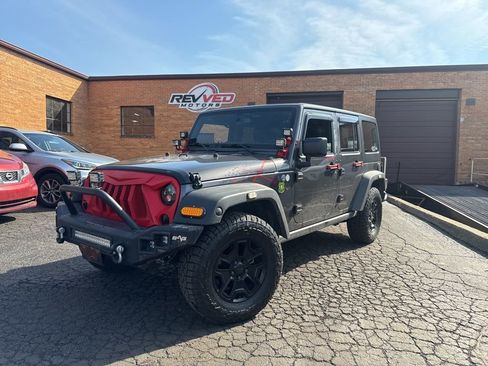 Used 2016 Jeep Wrangler Unlimited Sahara image 1