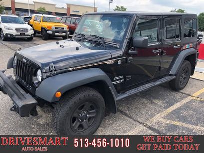 Used 2015 Jeep Wrangler Unlimited Sport w/ Mopar Black Appearance Group