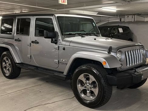 Used 2018 Jeep Wrangler Unlimited Sahara w/ Connectivity Group AWD/4WD image 1