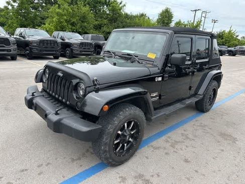Used 2012 Jeep Wrangler Unlimited Sahara w/ Dual Top Group AWD/4WD image 2