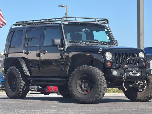 Used 2013 Jeep Wrangler Unlimited Sport AWD/4WD image 2