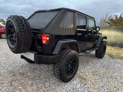 Used 2012 Jeep Wrangler Unlimited Sahara w/ Dual Top Group AWD/4WD image 3