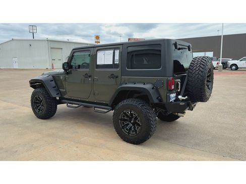 Used 2015 Jeep Wrangler Unlimited Rubicon w/ Dual Top Group AWD/4WD image 6