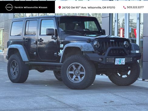 Used 2012 Jeep Wrangler Unlimited Rubicon w/ Dual Top Group image 1