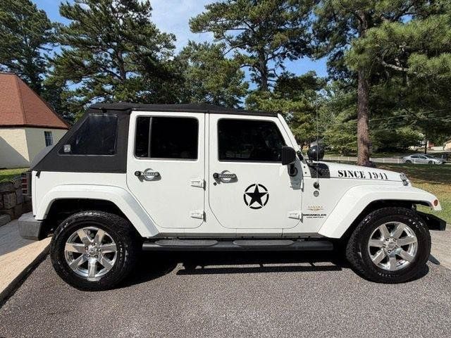 Used 2013 Jeep Wrangler Unlimited Sahara w/ Dual Top Group AWD/4WD image 2