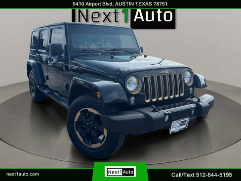 Used 2014 Jeep Wrangler Unlimited Sahara AWD/4WD image 1