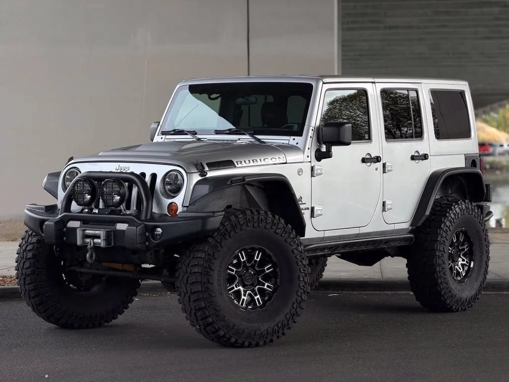 Used 2011 Jeep Wrangler Unlimited Rubicon w/ Dual Top Group AWD/4WD image 2
