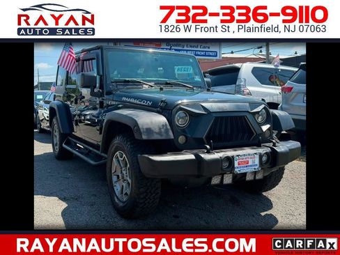 Used 2016 Jeep Wrangler Unlimited Rubicon w/ Dual Top Group AWD/4WD image 1