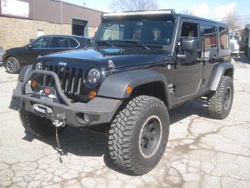 Used 2013 Jeep Wrangler Unlimited Sport image 1