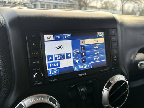 Used 2012 Jeep Wrangler Unlimited Sahara w/ Dual Top Group image 16