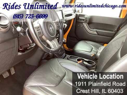 Used 2013 Jeep Wrangler Unlimited Sahara w/ Dual Top Group AWD/4WD image 13
