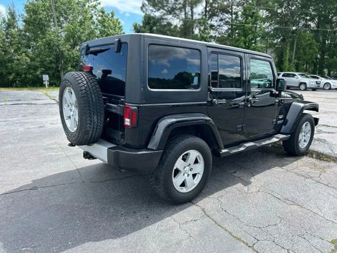 Used 2012 Jeep Wrangler Unlimited Sahara w/ Dual Top Group image 9