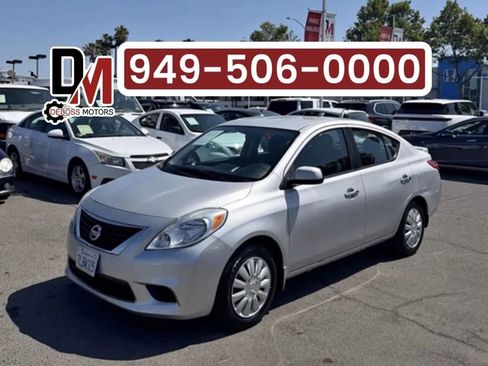 Used 2013 Nissan Versa SV FWD image 1