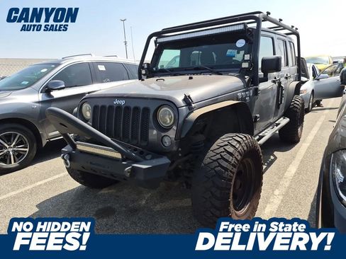 Used 2014 Jeep Wrangler Unlimited Sport w/ Quick Order Package 24S AWD/4WD image 1