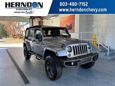 Used 2016 Jeep Wrangler Unlimited Sahara image 1