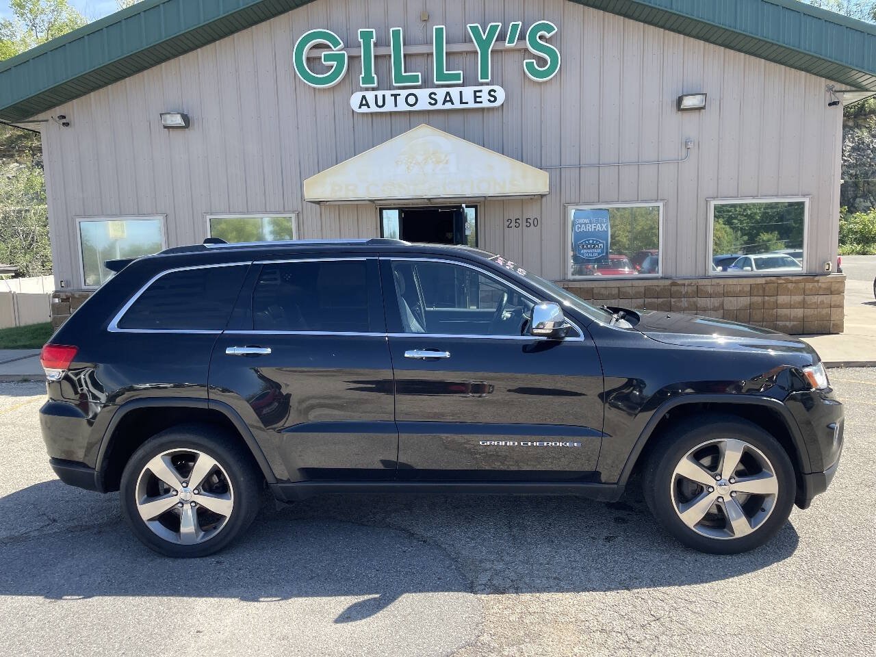 Used 2014 Jeep Grand Cherokee Limited w/ Luxury Group II AWD/4WD image 1