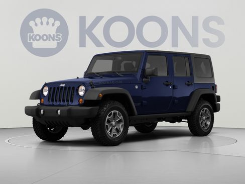 Used 2013 Jeep Wrangler Unlimited Sahara w/ Dual Top Group AWD/4WD image 1