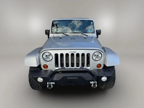 Used 2012 Jeep Wrangler Unlimited Sahara w/ Dual Top Group AWD/4WD image 13